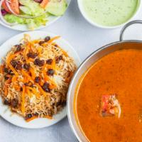 Butter Chicken · Our signature butter chicken is marinated overnight, cooked in a delicious creamy tomato sau...