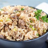 Cajun Fried Rice · Cajun spice-infused fried-rice sautéed with your choice of meats, seafood, and vegetables th...