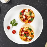Mediterranean Mornings Breakfast Burrito · Spinach, mushrooms, tomatoes, feta cheese, eggs, tomatoes and onions wrapped in a flour tort...