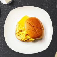 Cheesy Egg Sandwich  · Scrambled egg, and cheddar cheese served on a bread.