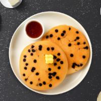 Chocolate Pancakes · Fluffy chocolate chip pancakes cooked with care and love served with butter and maple syrup....