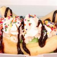 Banana Split · 3 scoops of SolDias ice cream, a whole banana, whipped cream and your choice of toppings and...