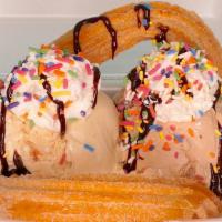 Sundae Churro · Best when shared! Yum.
Two scoops of homemade ice cream, two churros, lechera, cajeta, whipp...