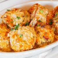 Stuffed Shrimp · Six gulf jumbos with crabmeat, scallops, and shrimp. Jasmine rice, seasonal vegetable medley.
