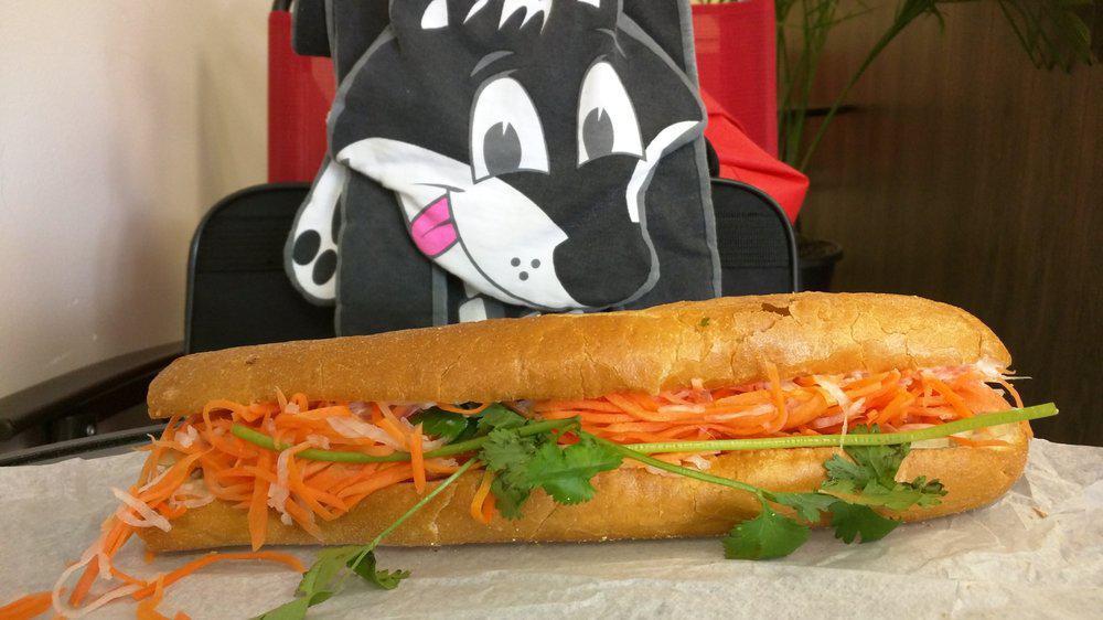 Grilled Pork Banh Mi · Pork cooked in smoky savory salty sauce.