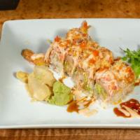 Angel Dragon Roll · Shrimp Tempura, Spicy Tuna, Avocado Roll with soy bean pepper. Spicy crab on top, and chef s...