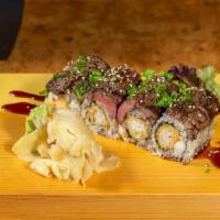 Filet And Lobster Roll · Lobster tempura with seared fillet mignon on top dressed with scallion and chef's special sa...