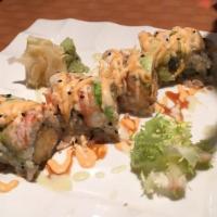 Out Of Control · Lobster tail tempura & crab  inside topped with eel, shrimp, avocado, served with chef's spe...