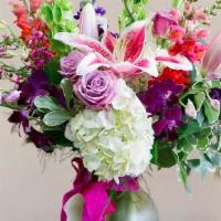 Lush & Lovely · Fragrant stargazer lilies, bells of Ireland, hydrangea, stock, snapdragons, and roses.