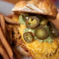 Big Messy Guacamole Burger* · 1 patty melted cheddar cheese, guacamole, pickled jalapenos, mayo, mustard, onions, lettuce,...