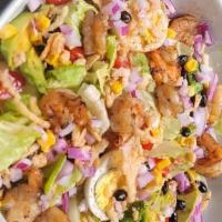 Shrimp Southwestern Salad · Grilled shrimp, mixed lettuce leaves, tomatoes chopped, avocado, red onion, french onions, e...