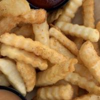 Basket Of Fries · Crinkle cut fries dusted with our house seasoning Served with our homemade fry sauce.
