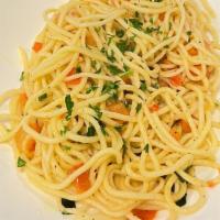 Garlic Pasta · Thin pasta sautéed in fresh garlic, basil and tomatoes, Add shrimp, clams or Mussels, Sausag...
