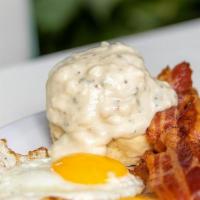 Two Egg Breakfast · two eggs any style, toast or biscuit, grits or brabant potatoes & choice of breakfast meat