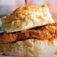 Fried Chicken Biscuit · fried chicken topped w/ cane syrup honey butter on our famous buttermilk biscuit w/ grits or...