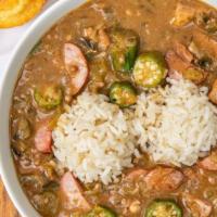 Gumbo · Dark-roux classic gumbo with andouille sausage and chicken thigh.  Served with a cornbread b...