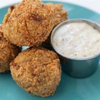 Boudin Balls · four of our signature boudin balls w/ pepper jack & creole mustard aioli