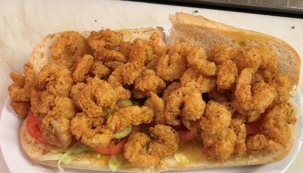 Fried Shrimp Po-Boy · Served on Leidenheimer bread & dressed (Lettuce, tomato, pickles, and remoulade) with Fries (substitute gumbo for additional charge)