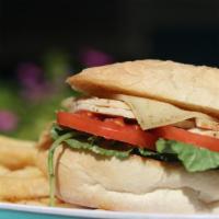 Chipotle Turkey · Turkey, chipotle ranch, spring mix, tomatoes & swiss on Leidenheimer french bread. Served w/...