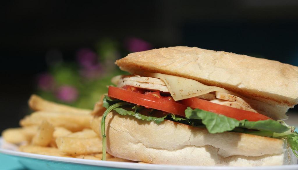 Chipotle Turkey · Turkey, chipotle ranch, spring mix, tomatoes & swiss on Leidenheimer french bread. Served w/ fries.