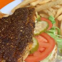 Blackened Catfish Po-Boy · Served on Leidenheimer bread &dressed (Lettuce, tomato, pickles, and remoulade) with Fries (...