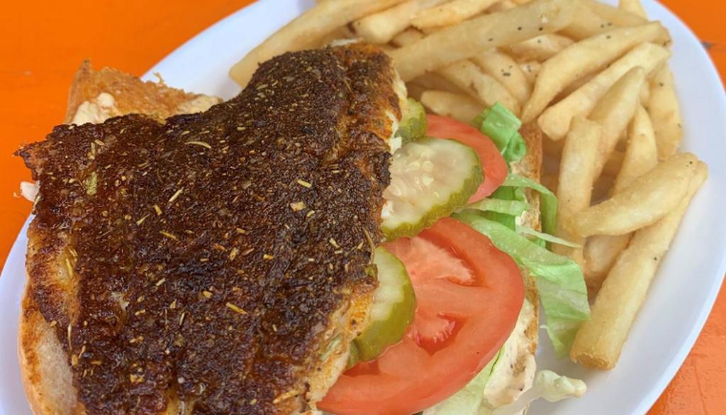 Blackened Catfish Po-Boy · Served on Leidenheimer bread &dressed (Lettuce, tomato, pickles, and remoulade) with Fries (substitute gumbo for additional charge)