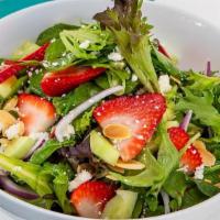 Strawberry Feta Salad · field greens, feta cheese, strawberries, tomatoes, toasted almonds, cucumber, red onions & o...