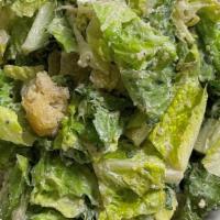 Caesar Salad · Romaine, focaccia croutons, and parmigiano-reggiano.