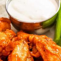 Party Wings (100 Pieces) · Choose up to four flavors.