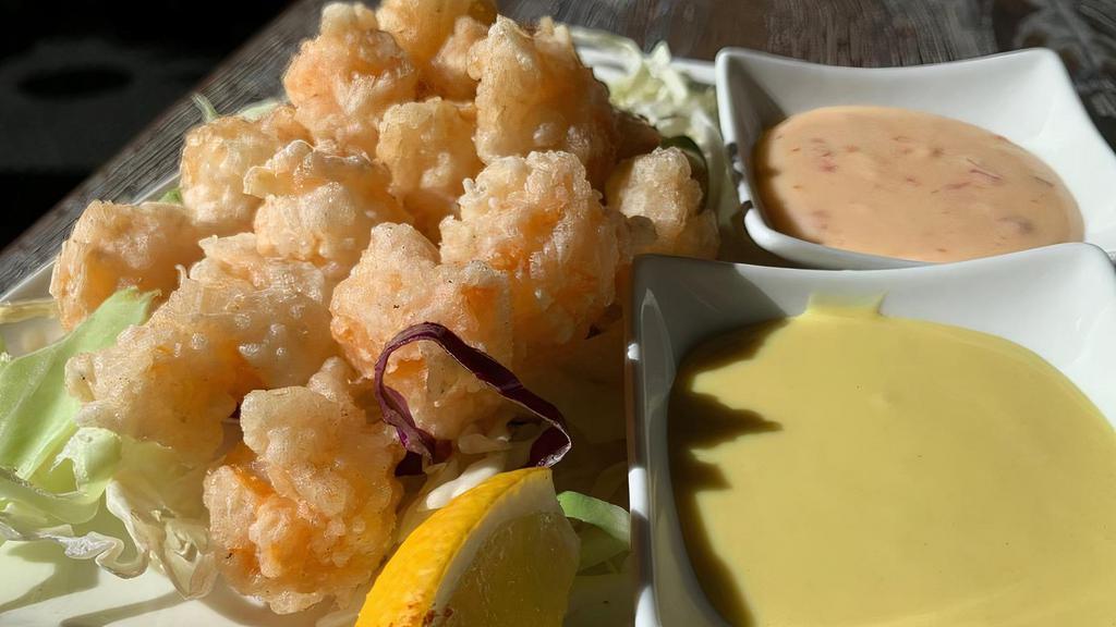 Popcorn Shrimp · crispy rock shrimp, served with two dipping sauces (sweet thai chili aioli and honey mustard)