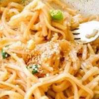 Garlic Noodles · egg noodles, green onions, parmesan, and soy