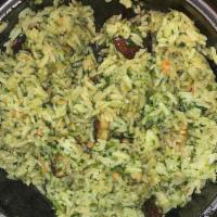 Cilantro Rice · Jasmine white rice mixed with a cilantro-basil pesto, sesame soy, bell pepper, and hearty pa...