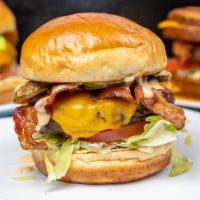 Pickle Monster · Cheddar, Bacon, Fried Pickles, Chipotle Ranch, Lettuce, and Tomato.