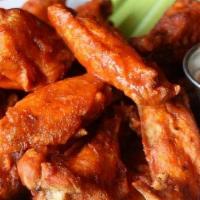 Buffalo Wings · Choice of Buffalo, barbecue, chipotle-honey or OldBay. Comes with choice of ranch or blue ch...