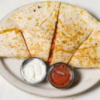 Roasted Chicken Quesadillas · Loaded with seasoned chicken, jack and cheddar cheeses, tomato and onion. Grilled in a fresh...