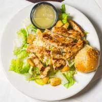 Parmesan Chicken Caesar · Garden fresh romaine lettuce, croutons and parmesan cheese topped with char-grilled, marinat...