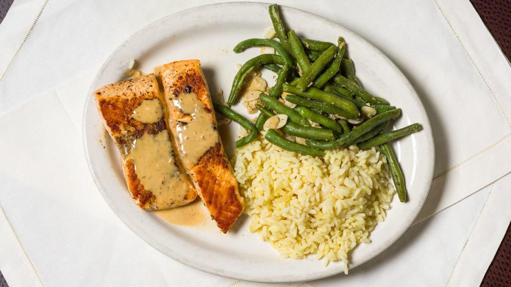 Asian Ginger Salmon · Char-grilled salmon topped with our signature sesame ginger sauce. Served with rice and vegetables.