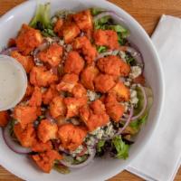 Buffalo Chicken Salad · Grilled or Fried Chicken Tossed In Buffalo Sauce Over Mixed Spring Greens, Chopped Tomato, R...