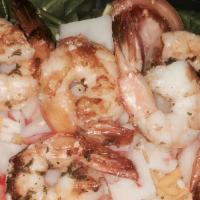 Seafood Salad · Romaine lettuce and spinach with crab meat, 8 pieces grilled jumbo shrimp, tomatoes, cucumbe...