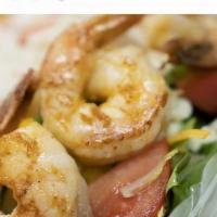 Shrimp Salad · Iceberg and romaine lettuce with grilled jumbo shrimp, tomatoes, cucumbers, cheddar, and moz...