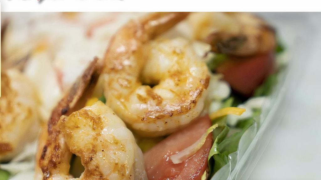 Shrimp Salad · Iceberg and romaine lettuce with grilled jumbo shrimp, tomatoes, cucumbers, cheddar, and mozzarella cheese. Include breadsticks.