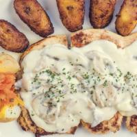Pechuga A La Colombiana · Grilled chicken with mushrooms in cream sauce.