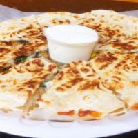Quesadilla Special · Double tortilla (choice of protein) with melted white cheese + grilled onions, peppers, spin...