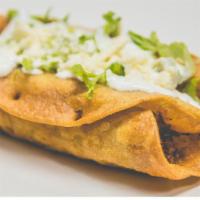 Dorado · 1 Rolled and fried corn tortilla, filled with chicken then topped with lettuce, queso fresco...