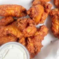 Chicken Wings · Deep-fried chicken wings with your choice of sauce.