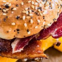 Nyc-Style B.E.C. · Bacon, eggs, american cheese, spicy mayo on bagel of choice. Treat yourself - croissant for ...