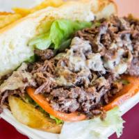 Steak & Cheese · Roast beef, provolone, lettuce, tomato, onion, spicy chipotle mayo.
