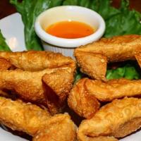 Crab Rangoon (6) · Wontons filled with cream cheese, imitation crab, green and yellow onions, served with house...