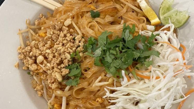 Pad Thai (Gf) · Thai famous stir-fried noodle with choice of meat, egg, bean sprouts, green onions, cilantro, and crushed peanuts. Gluten free.