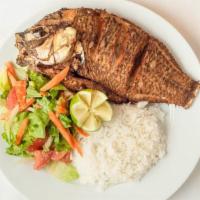 Fried Fish · Deep fried croaker fish served with rice and salad.
